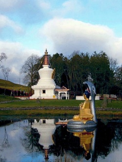 Samye ling stupa and statue.jpg