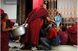 Young-and-old-monks-distributingcctan.jpg
