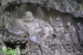 Maitreya and disciples carving in Feilai Feng Caves.jpg