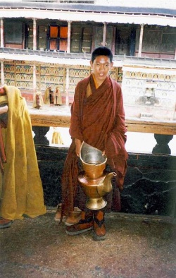 Novice monk with teapot.jpg