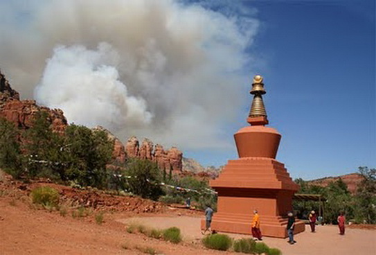 File:Stupa and fire.jpg