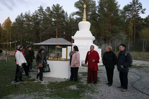 File:Conference lecturers looking the new Buddhist Architecture at Veltsa.Stupa-and-Fire temple.jpg