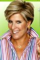 Finance guru Suze Orman with collar up