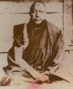 Photo of the ninth Nyenpa Rinpoche,taken by Situ Pema Wongchuk. The strange mark on his forehead is an anomaly in the original negative.