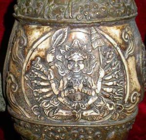 Detail of the carving on a tantric ritual vase.