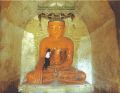 Restore central Buddha. Theme of the Seven Weeks painted on side walls, c. 18th century. Devotee applying gold leaf. Shrine, east.