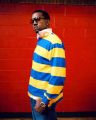 Kanye West, musician, with collar up