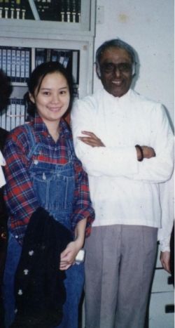 in white and a student-friend with flannel shirt, collar up