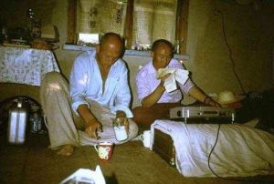 Vaartnou (left) and Baashan (right) studying texts together (slide 22)