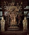 Fukūkenjaku Kannon 不空羂索観音 (H = 3.62 meters,)Flanked by Nikko (right) and Gakko (left) with hands in the Gassho mudra (prayer, veneration). 746-748 AD, Dry Lacquer, Tōdaiji Temple 東大寺 (Nara)