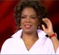 Oprah Winfrey with white shirt, collar up