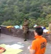 Lay Buddhists at (right and above in orange)