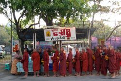 Monks throughout Burma make alms rounds around the community in the early morning.