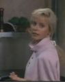 Cheryl Ladd, actress, with polo shirt, collar up and buttoned to the top. Polo shirts with collar up and buttoned to top have an especially similar look to the mandarin collar.
